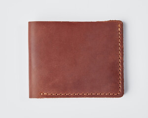 Personalized brown leather billfold wallet with embossing on white