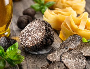 Summer truffles and truffle slices isolated on white background. Close-up.