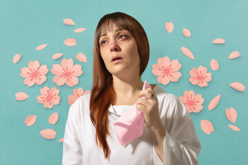 woman with allergy and flowers