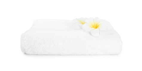 Obraz na płótnie Canvas Terry towel and plumeria flowers isolated on white