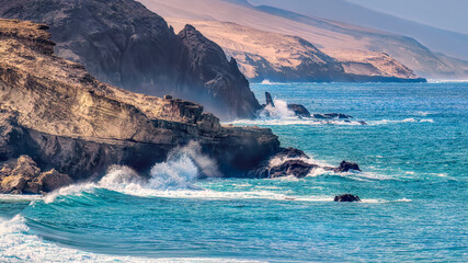 Breathtaking view of Playa del Viejo with dramatic cliffs and the atlantic ocean with surging...