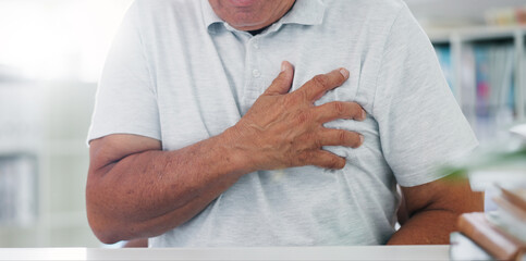 Man, hands and chest pain with heart, illness or cancer in discomfort, emergency or healthcare at...
