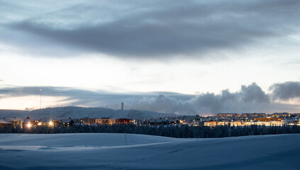 Winter landscape at night in Kiruna Lapland Sweden at night. Photographed 9 February 2024.
