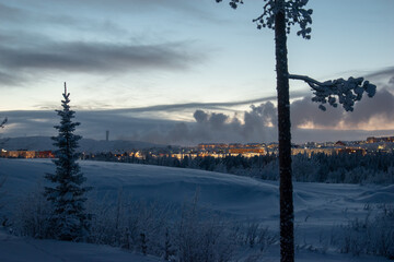 Fototapeta na wymiar Winter landscape at night in Kiruna Lapland Sweden at night. Photographed 9 February 2024.