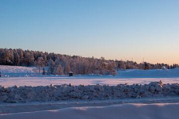 Idyllic panoramic view of a beautiful white winter wonderland scenery in Scandinavia, Swedish Lapland.