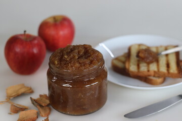 Delicious homemade apple jam in glass jar