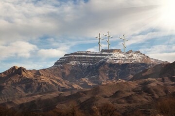 Easter morning, hill with wooden cross