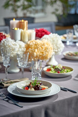 Stewed veal cheeks with mashed potatoes and vegetables