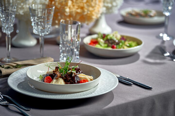 Stewed veal cheeks with mashed potatoes and vegetables
