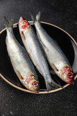 fresh herring fish raw seafood tasty fresh eating cooking meal food snack on the table copy space food background rustic top view Pescetarian diet