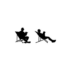 People are reading books. People enjoy summer. People sitting on a deck chair beach, tourists, island, travel, palm trees, relaxation. Silhouette people sitting on the beach