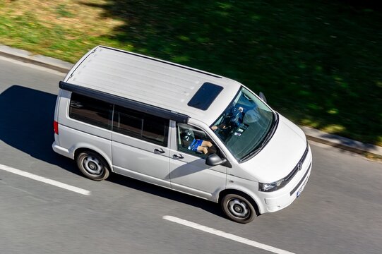 Volkswagen Transporter T5 TDI California with camper awning with motion blur effect