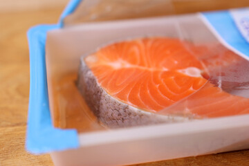 Salmon steak unpacked from vacuum packaging