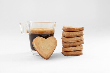 Cup of coffee and heart-shaped cookies for Valentine's Day