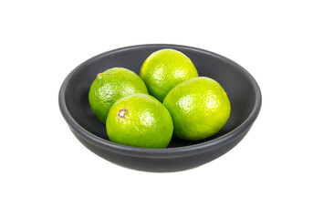 Fresh limes in a plate isolate
