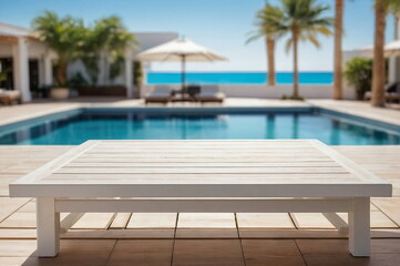 Fototapeta premium White wooden empty podium, product presentation , visual layout on summer travel hotel swimming pool background. Copy space