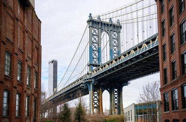 The iconic Manhattan Bridge, view from the well-known selfie spot at Washington Street intersection in Dumbo, Brooklyn, New York, USA