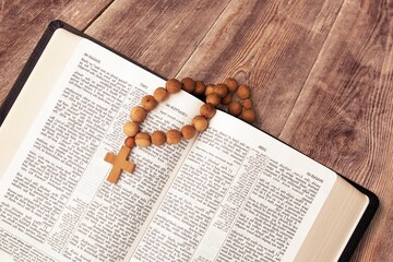 Open vintage old holy Bible book