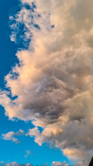 Scenic sunset view of magical pink cloud formations seen from Altfinkenstein at Baumgartnerhoehe, Carinthia, Austria. Calm serene atmosphere. Cloudscape against blue sky. Heaven like feeling