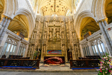 The Gothic interior high and altar of historic Winchester Cathedral also known as Cathedral Church...