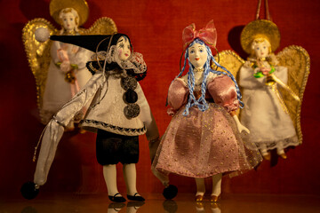 Antique toys - characters from fairy tales. Pierrot, Malvina and the angels.