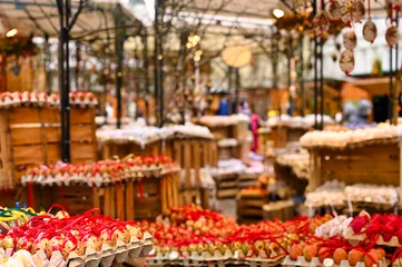 Gartenposter Traditional Easter market with colorful and painted easter eggs in Vienna Austria © goce risteski