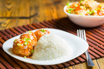 Chinese-style meatballs in sweet and sour sauce