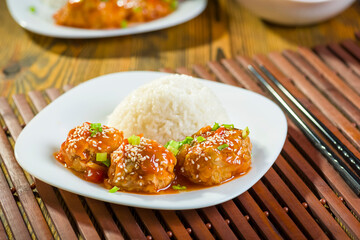Chinese-style meatballs in sweet and sour sauce