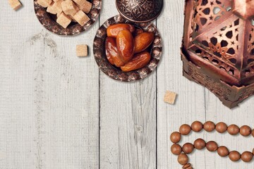 Ramadan holiday concept with date fruits and decor