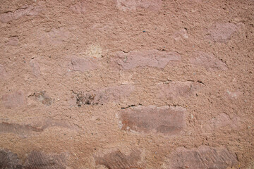 Stone wall with old bricks of the acient castle.