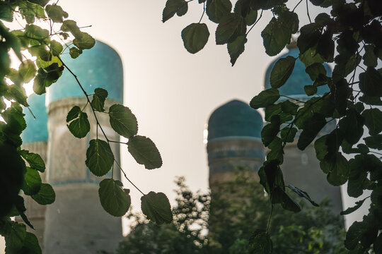 Exterior of Chor Minor Madrasah in the ancient city of Bukhara in Uzbekistan, oriental architecture at sunset in the evening