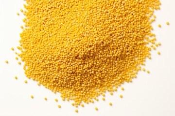 A pile of yellow mustard seeds on a white background. Generative AI.