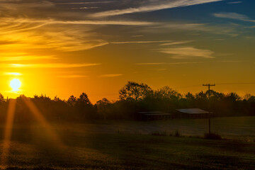 Naklejka na ściany i meble Beautiful sunrise seen in Virginia's rural Countryside