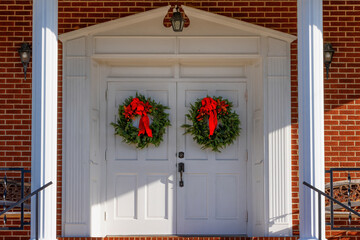 Chrismas wreaths on the doors to a church in rural Tennesse, USA