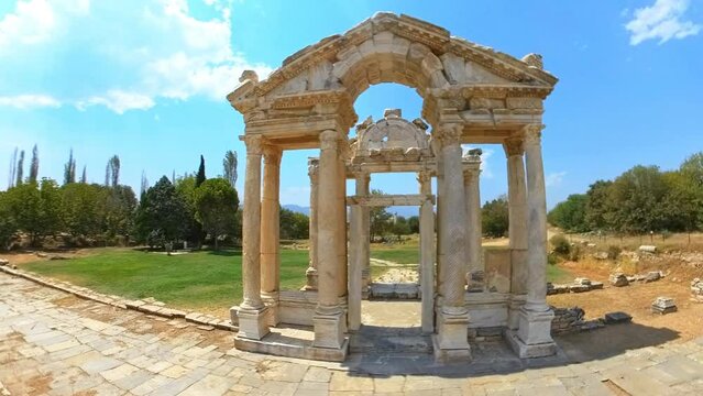 Aerial HYPER-LAPSE view of the ancient monumental gateway or tetrapylon, in Aphrodisias UNESCO archaeological site. Ancient Greek Hellenistic city dedicated to the goddess Aphrodite. UNESCO site.