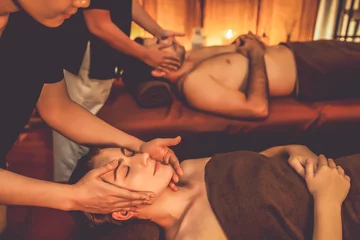 Gordijnen Couple customer enjoying relaxing anti-stress head massage and pampering facial beauty skin recreation leisure in warm candle lighting ambient salon spa in luxury resort or hotel. Quiescent © Summit Art Creations
