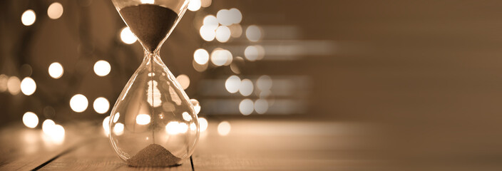 Hourglass on bokeh background