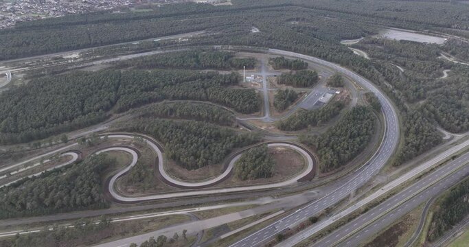 Testing track for land vehicles. automotive industry, testing facilities. Aerial birds eye drone view.