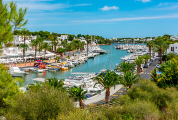 Fototapeta na wymiar Yachts and boats in Cala D'Or marine, Mallorca island, Spain