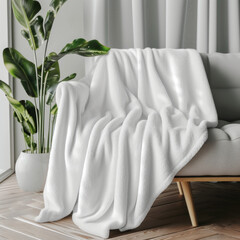 Clean and cozy white fleece blanket mockup, perfect for showcasing custom designs or branding for home decor products.