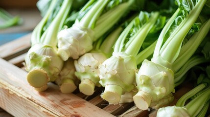 Fresh Bok Choy on Wooden Surface: Fresh bok choy bunches lined up on a wooden surface, showcasing their leafy greens and white stems - obrazy, fototapety, plakaty
