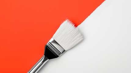 The background is painted white and red diagonally. A brush in white paint lies in the center 