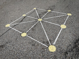 tic-tac-toe game board painted on the asphalt of a street, street games, popular games
