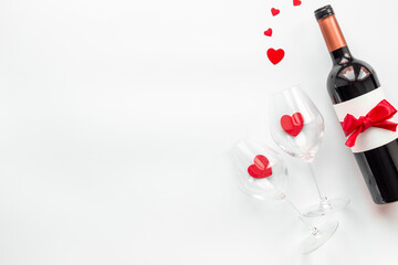 Fototapeta na wymiar Bottle of red wine for Valentines Day celebration, top view