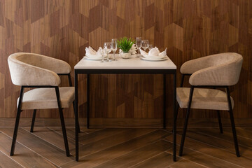 Table set up for two in a cafe, cafeteria, restaurant.