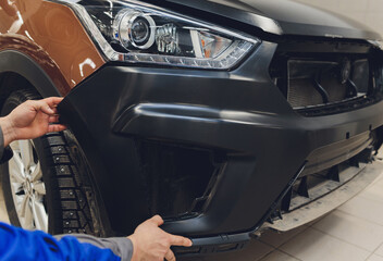 auto mechanic repair car body bumper replacement.
