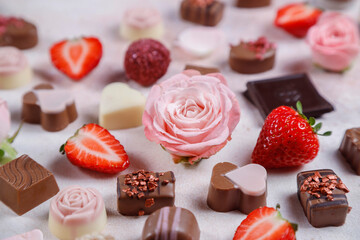 Valentines Day card with flowers chocolates and strawberries.