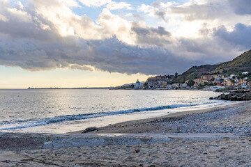 View from the beach towards the city of Messina - Sicily - Italy