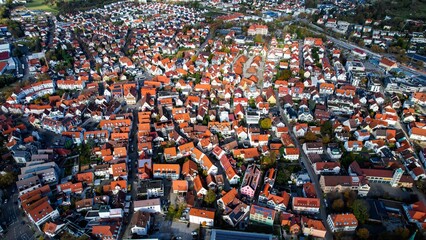 Aerial of the city Metzingen in Germany on a sunny day in autumn