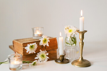 Old books and white flowers